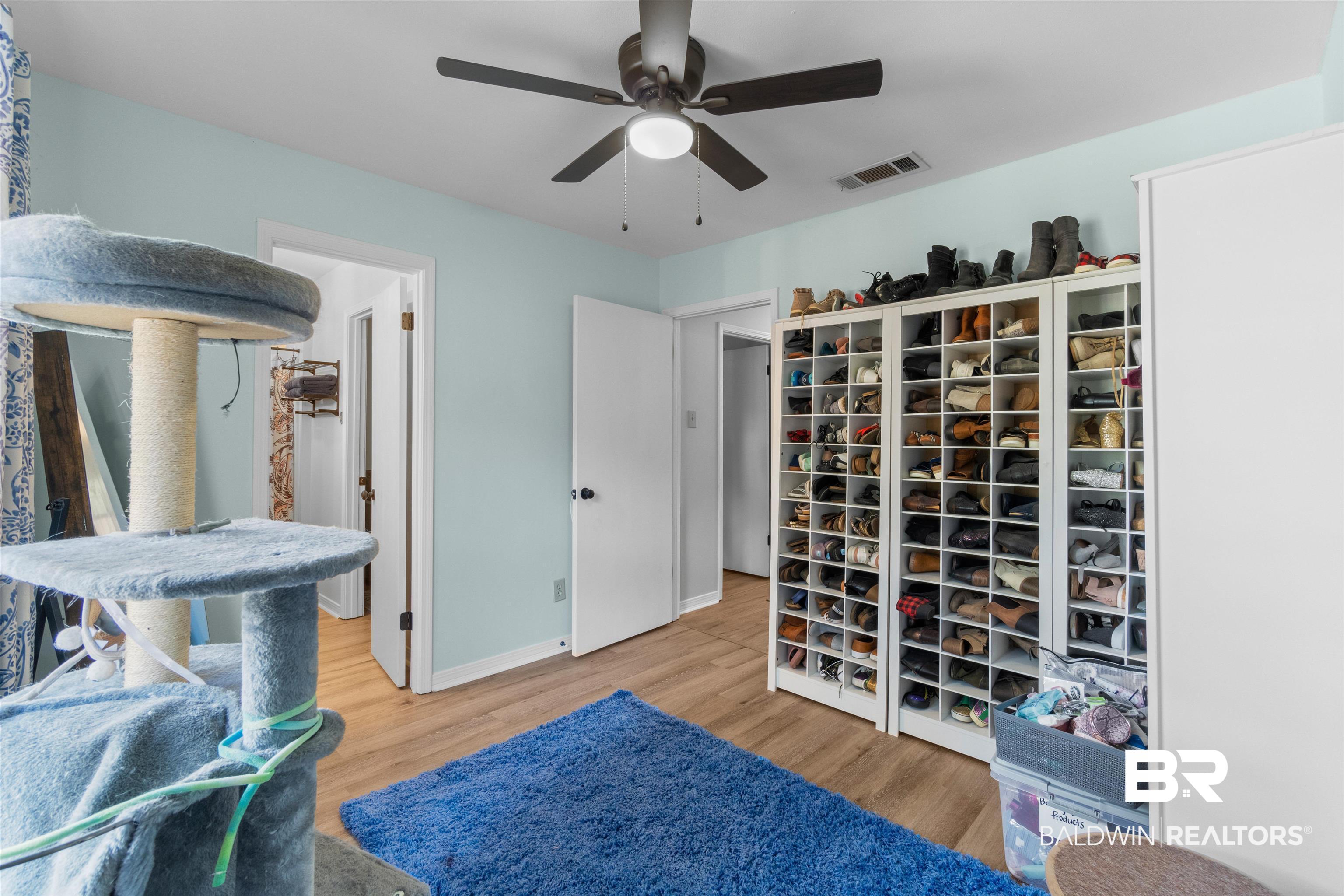 149 Montclair Loop Daphne, AL 36526 - Photo 28 of 30 Living area featuring light wood-style floors and a ceiling fan