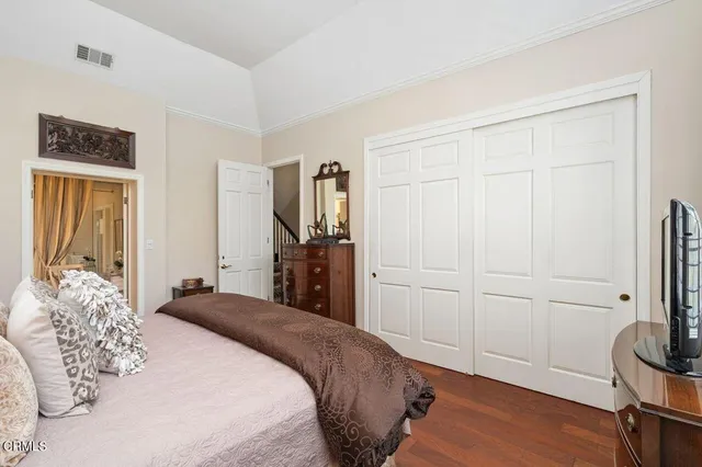 a bathroom with a tub shower and a sink