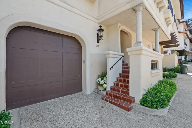 a view of a house with a street