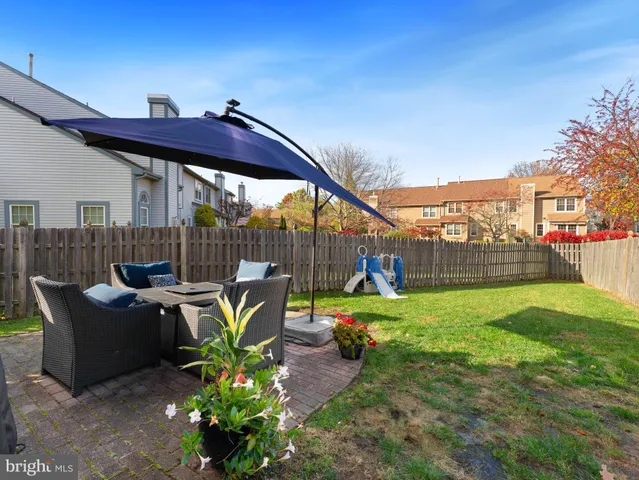 a garden view with a seating space