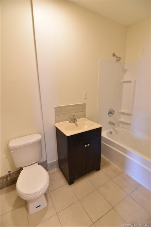 14 Wildwood Avenue Waterbury, CT 06710 - Photo 9 of 12 a bathroom with a sink and a toilet
