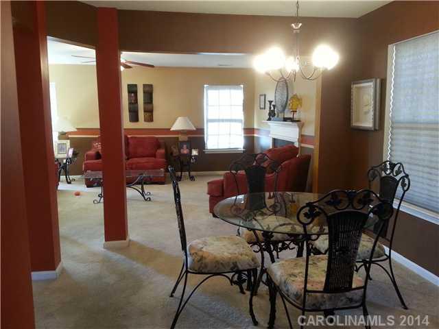 2742 Rustic Ridge Court, Unit 71 Rock Hill, SC 29730 - Photo 6 of 16 a dining room with furniture and window