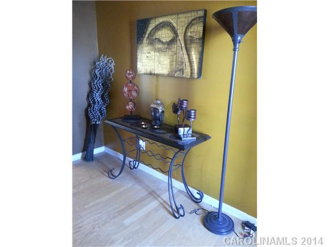 2742 Rustic Ridge Court, Unit 71 Rock Hill, SC 29730 - Photo 7 of 16 a room with a table and a mirror