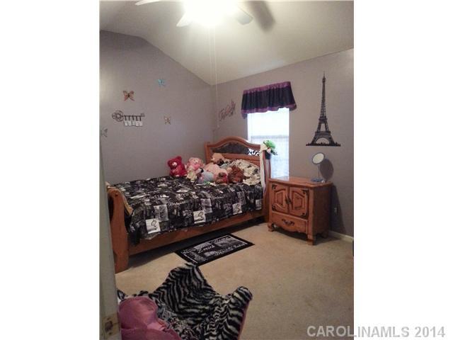 2742 Rustic Ridge Court, Unit 71 Rock Hill, SC 29730 - Photo 10 of 16 a bed room with a bed and a window