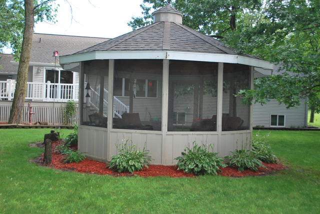 9217 Oak Ridge Drive Rochelle, IL 61068 - Photo 20 of 25 a view of a house with garden