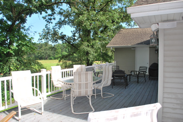 9217 Oak Ridge Drive Rochelle, IL 61068 - Photo 22 of 25 a view of a dinning table and chairs in the patio
