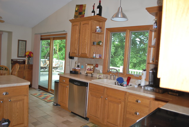 9217 Oak Ridge Drive Rochelle, IL 61068 - Photo 4 of 25 a kitchen with a window a sink and cabinets