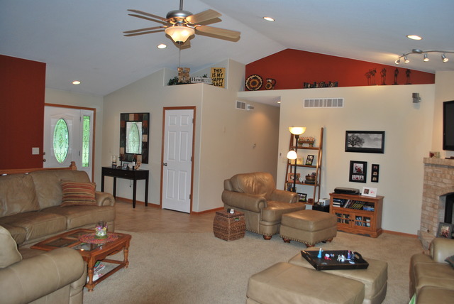 9217 Oak Ridge Drive Rochelle, IL 61068 - Photo 5 of 25 a living room with furniture and a chandelier