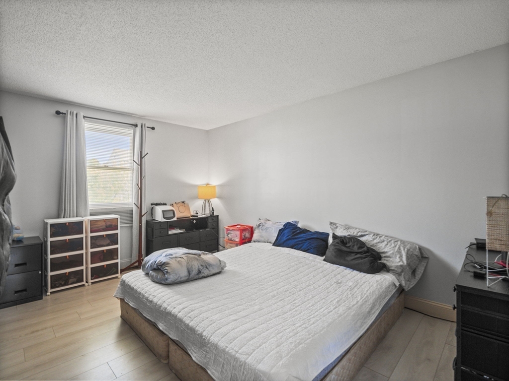 146 Lisbon Street Fall River, MA 02721 - Photo 14 of 42 a bedroom with a bed and dresser