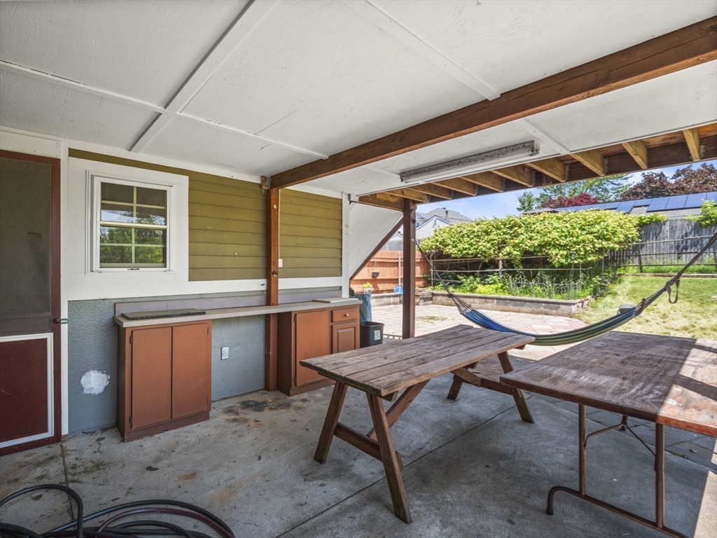 146 Lisbon Street Fall River, MA 02721 - Photo 34 of 42 a view of balcony with wooden floor and outdoor seating