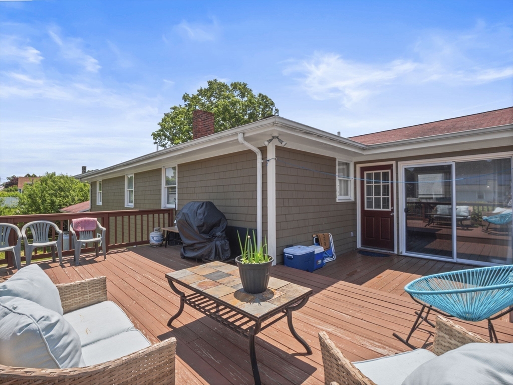 146 Lisbon Street Fall River, MA 02721 - Photo 36 of 42 a view of a patio with couches chairs and a table