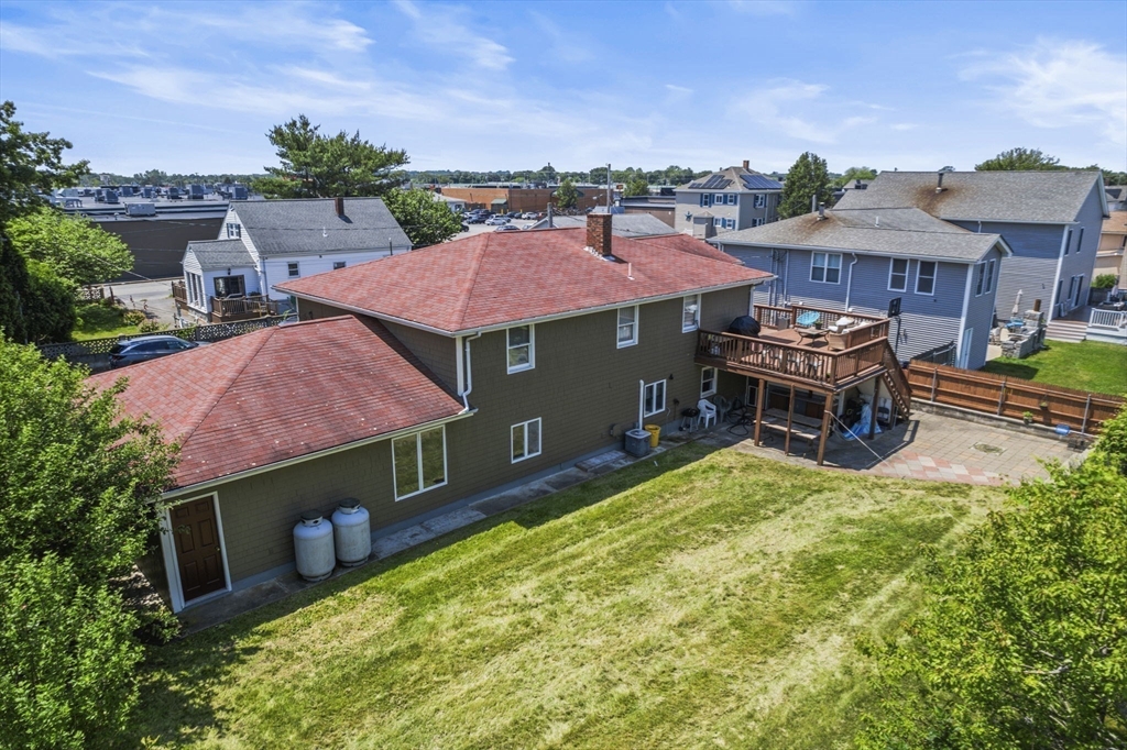 146 Lisbon Street Fall River, MA 02721 - Photo 38 of 42 a aerial view of a house with table and chairs