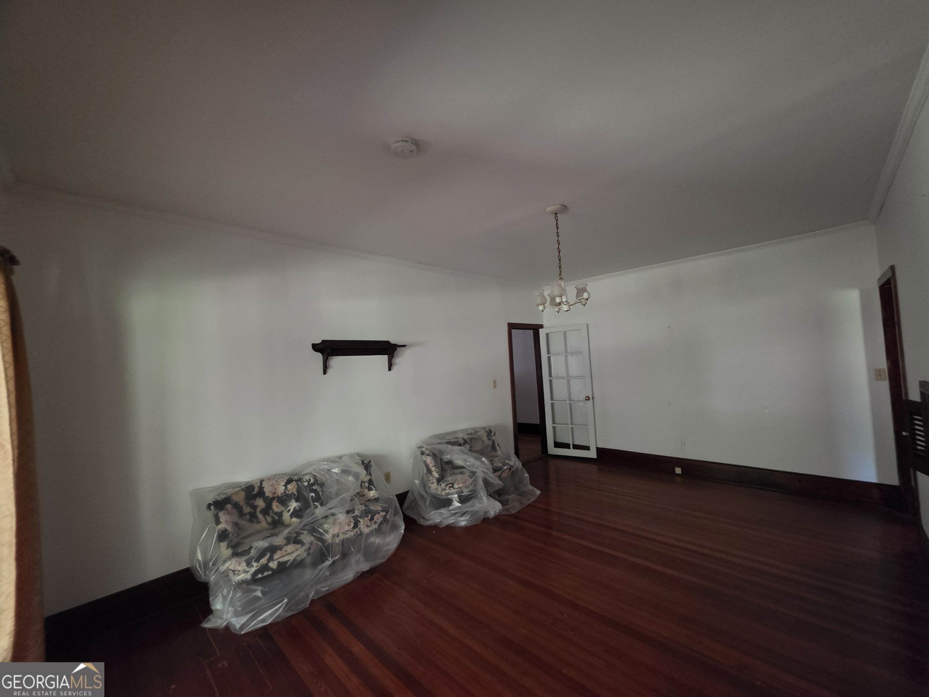 109 Springdale Drive Washington, GA 30673 - Photo 11 of 35 a view of a livingroom with wooden floor