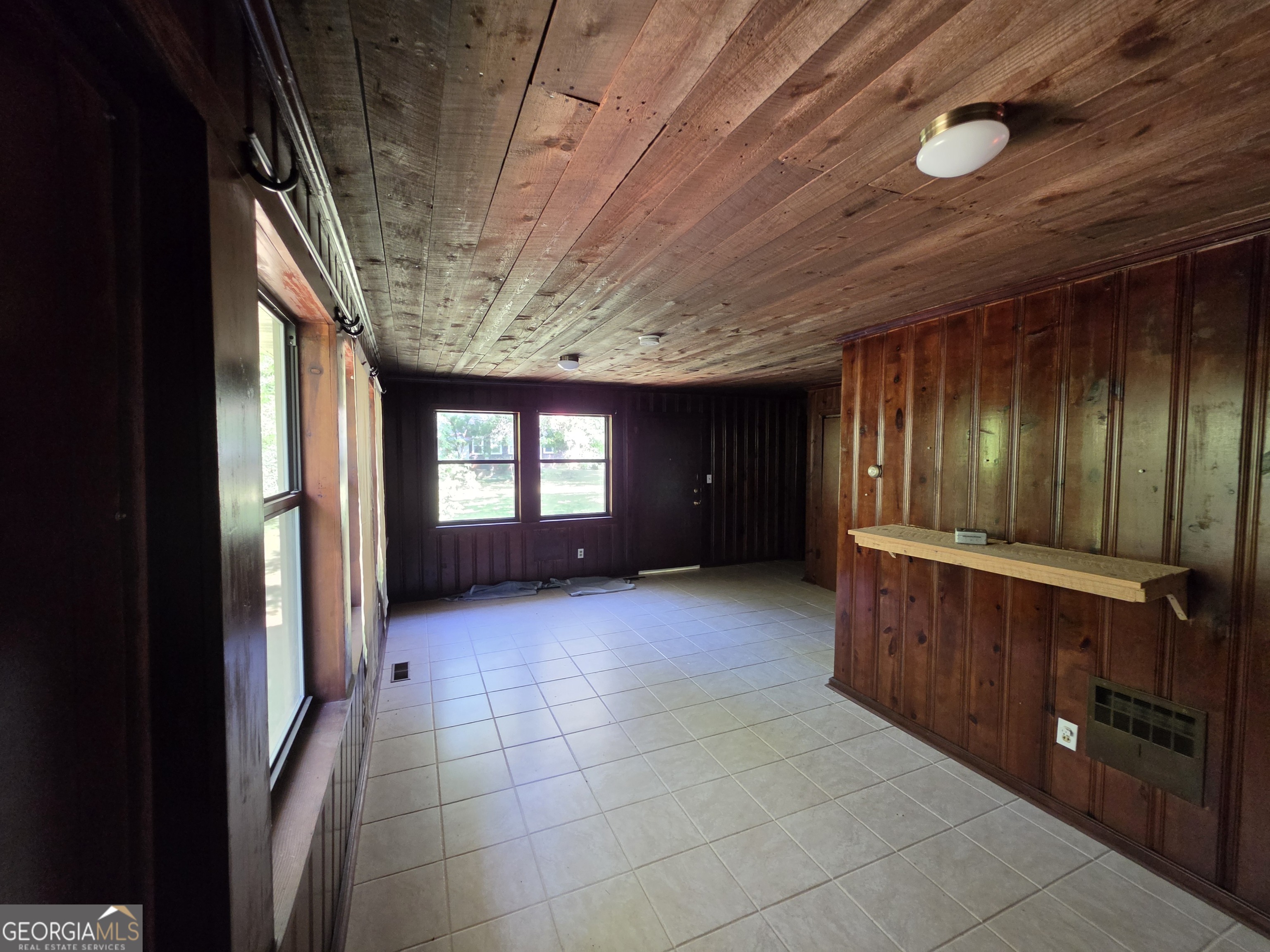 109 Springdale Drive Washington, GA 30673 - Photo 17 of 35 a view of an empty room with a window