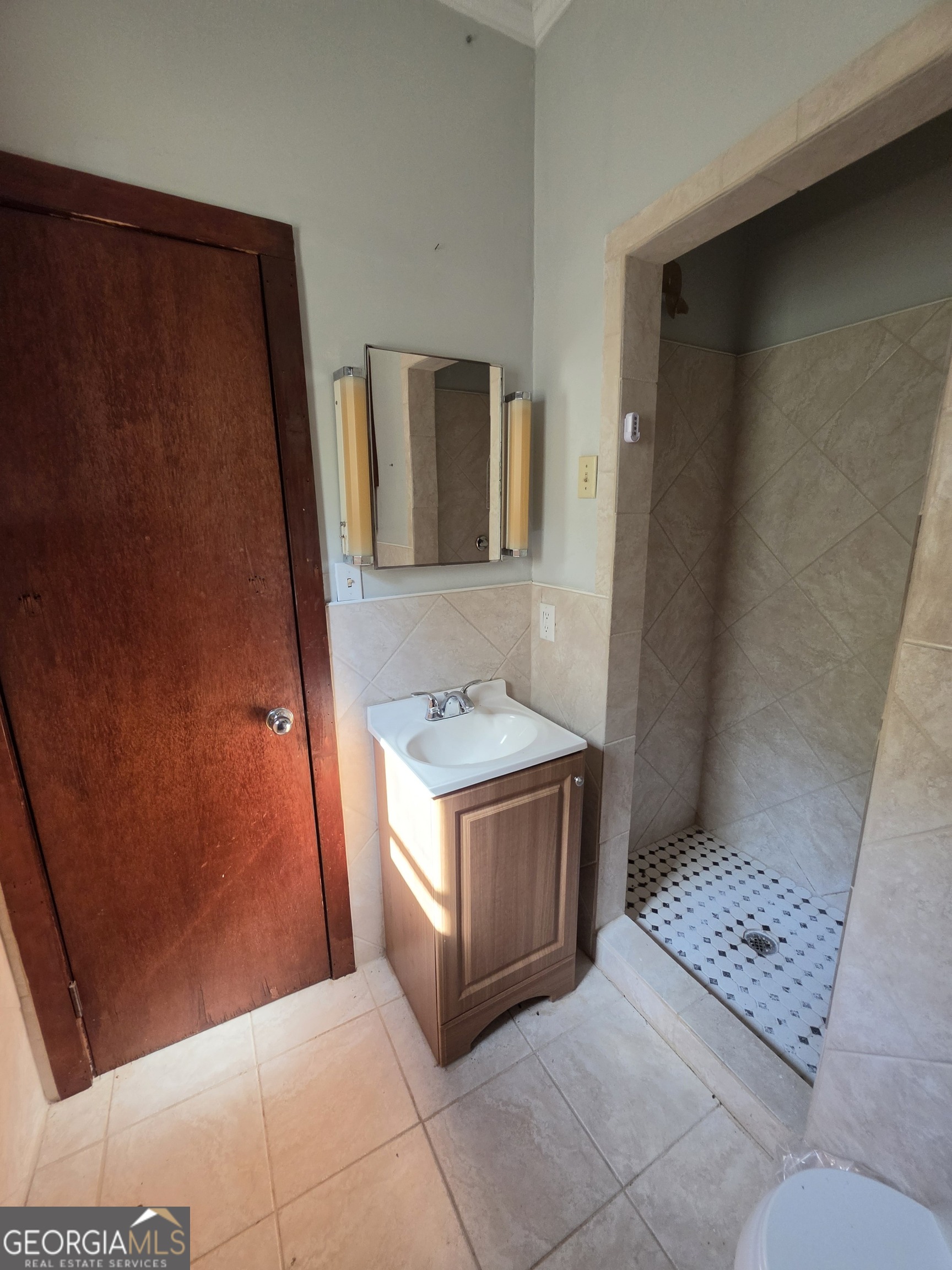 109 Springdale Drive Washington, GA 30673 - Photo 20 of 35 a bathroom with a sink and a mirror