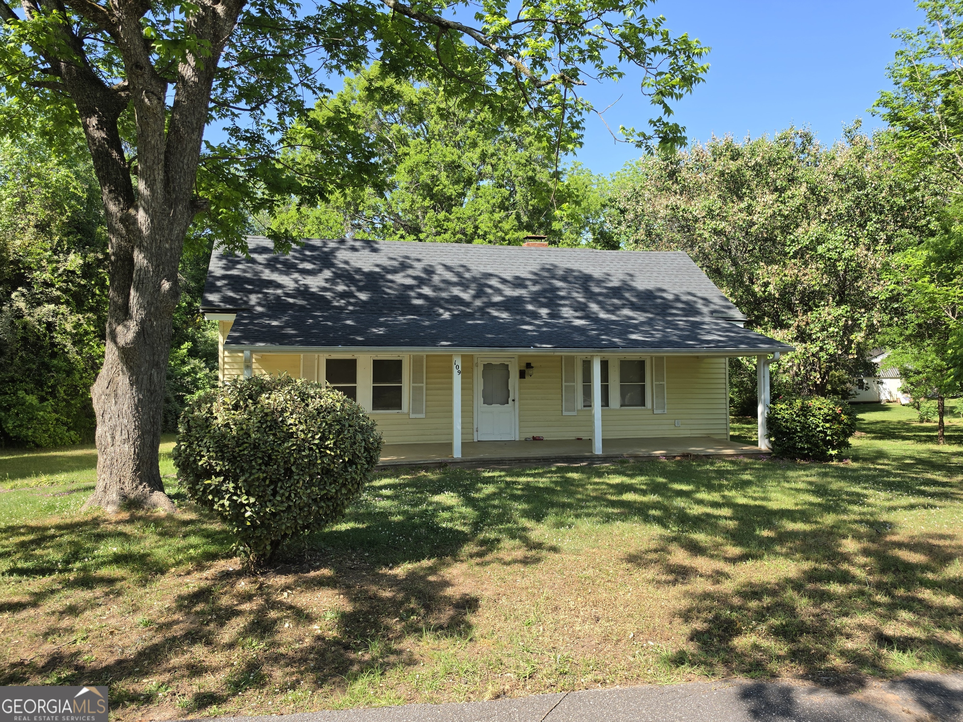 109 Springdale Drive Washington, GA 30673 - Photo 2 of 35 front view of a house with a yard