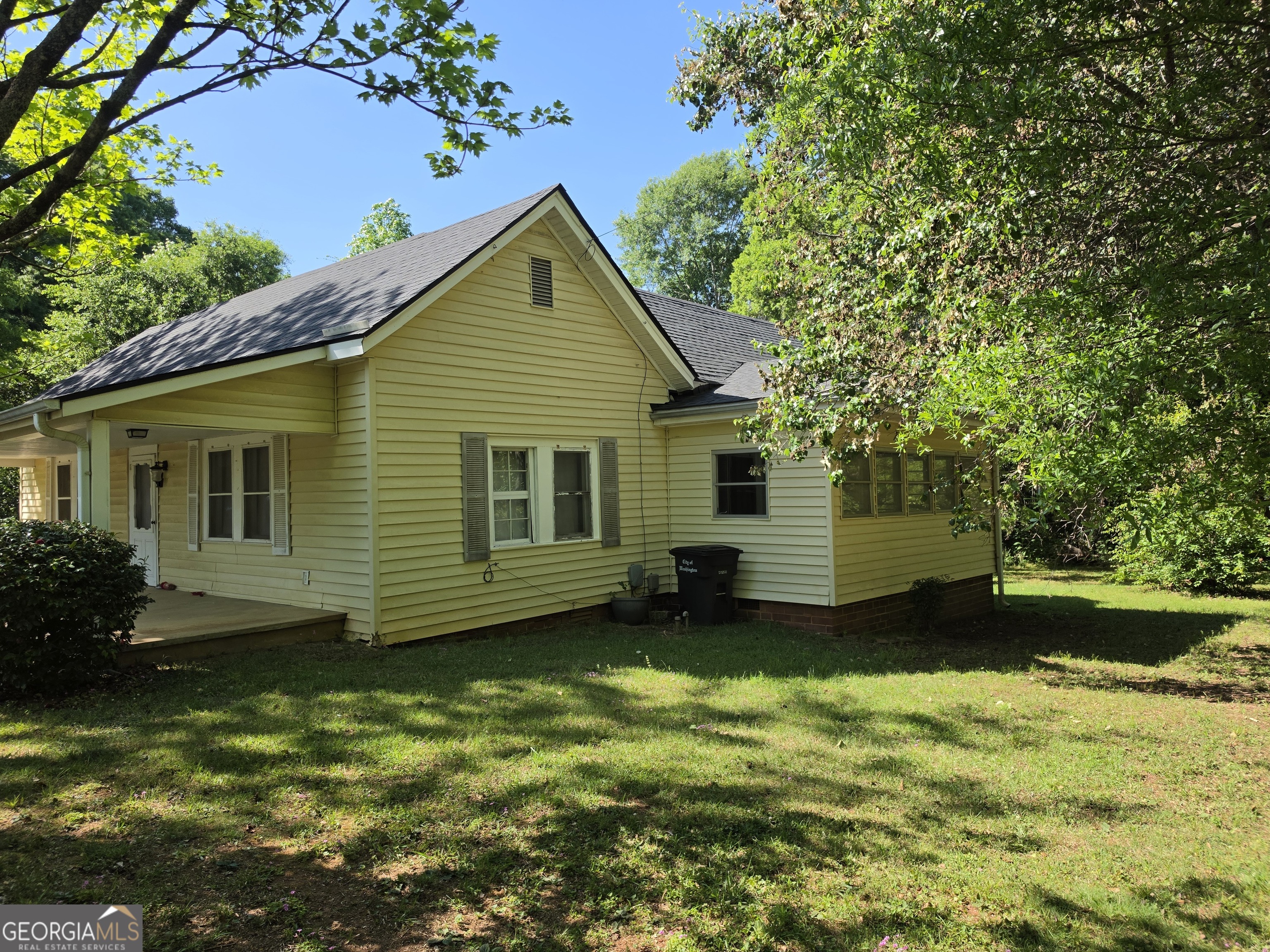 109 Springdale Drive Washington, GA 30673 - Photo 3 of 35 a view of a house with a yard