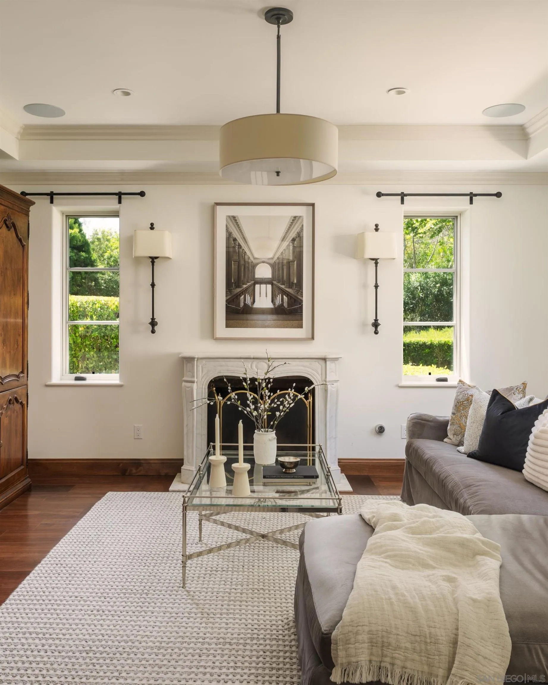 5406 Calzada Del Bosque Rancho Santa Fe, CA 92067 - Photo 10 of 30 a living room with furniture and a fireplace
