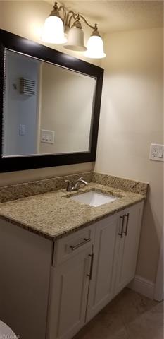 16710 Partridge Place Road, Unit 101 Fort Myers, FL 33908 - Photo 14 of 18 Granite Counter tops in guest bathroom