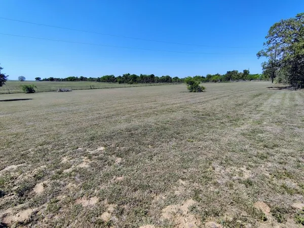 a view of lake with sunset