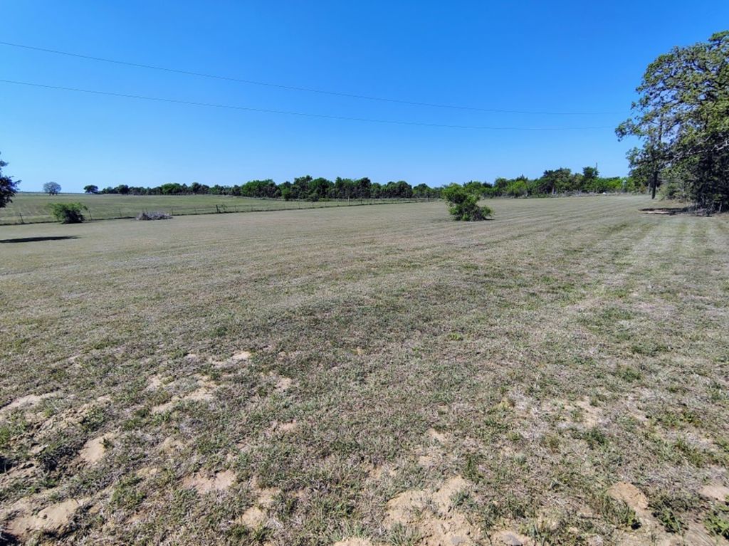 Tbd Sayers Road Elgin, TX 78621 - Photo 5 of 9 a view of lake with sunset