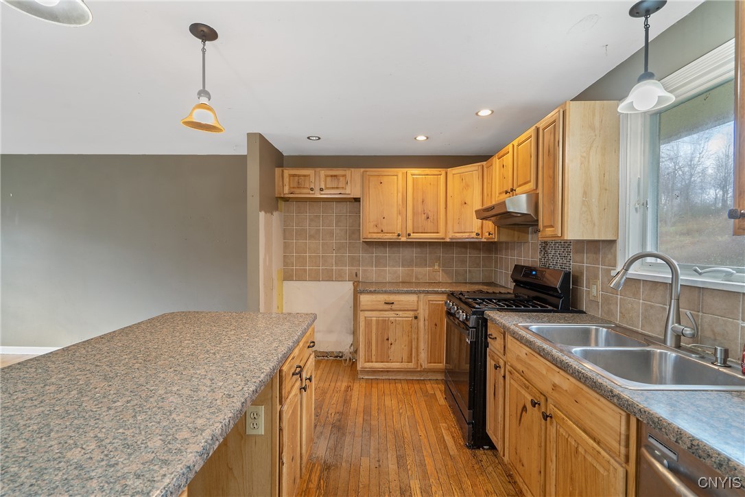 3617 Warners Road Camillus, NY 13209 - Photo 11 of 31 Another look down the countertops of the kitchen,