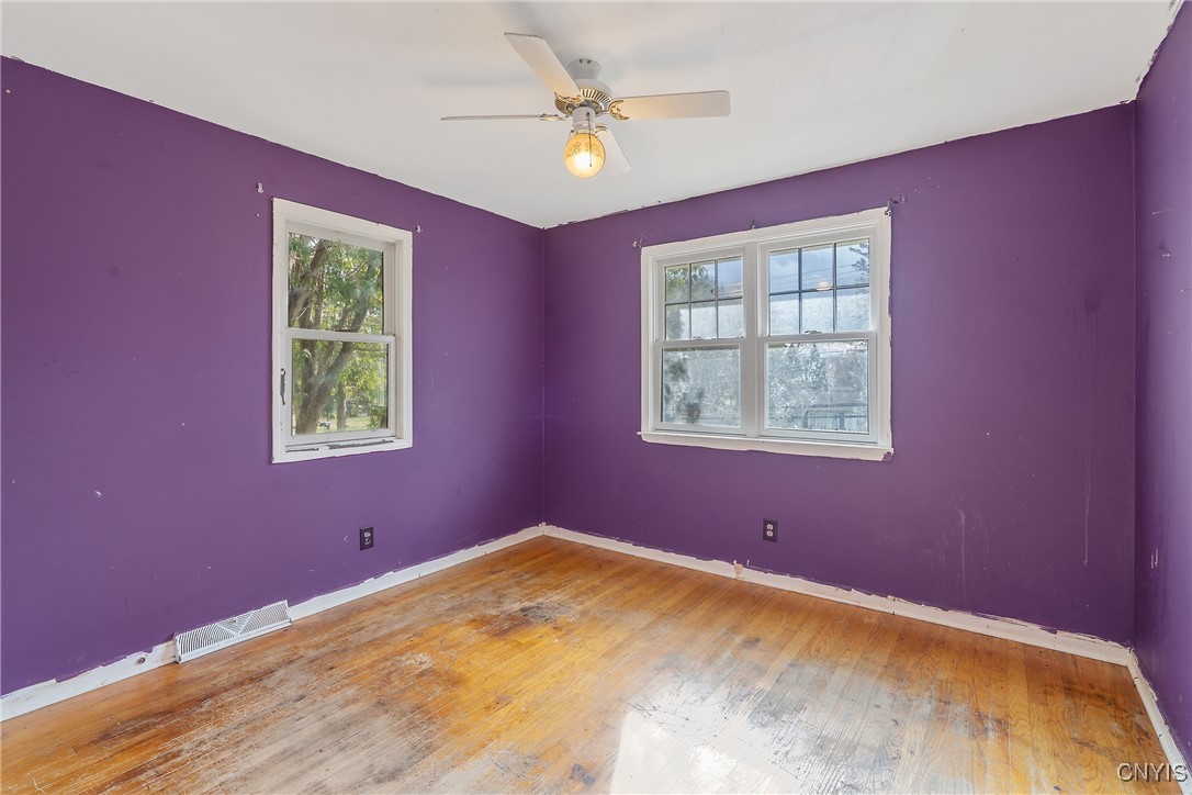3617 Warners Road Camillus, NY 13209 - Photo 18 of 31 The second bedroom is also good-sized, with overhe