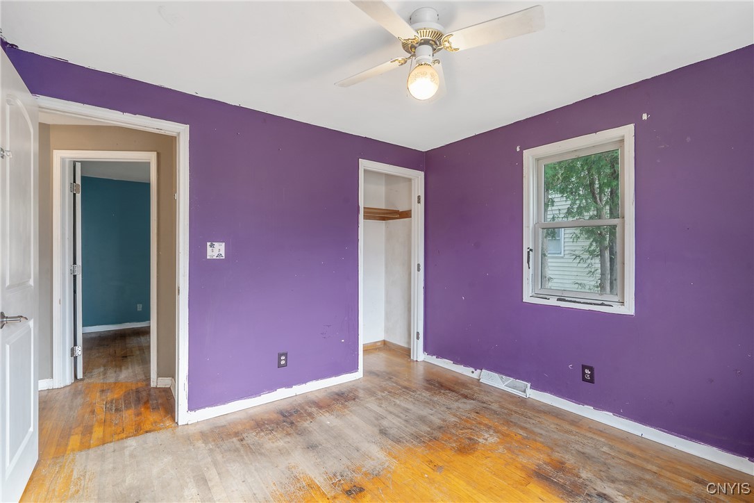 3617 Warners Road Camillus, NY 13209 - Photo 19 of 31 On the other side of the room we see the closet as