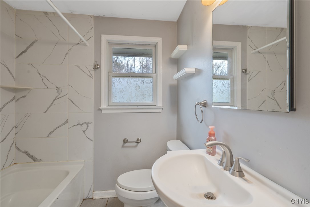 3617 Warners Road Camillus, NY 13209 - Photo 20 of 31 The full bathroom boasts a full tub/shower and ped