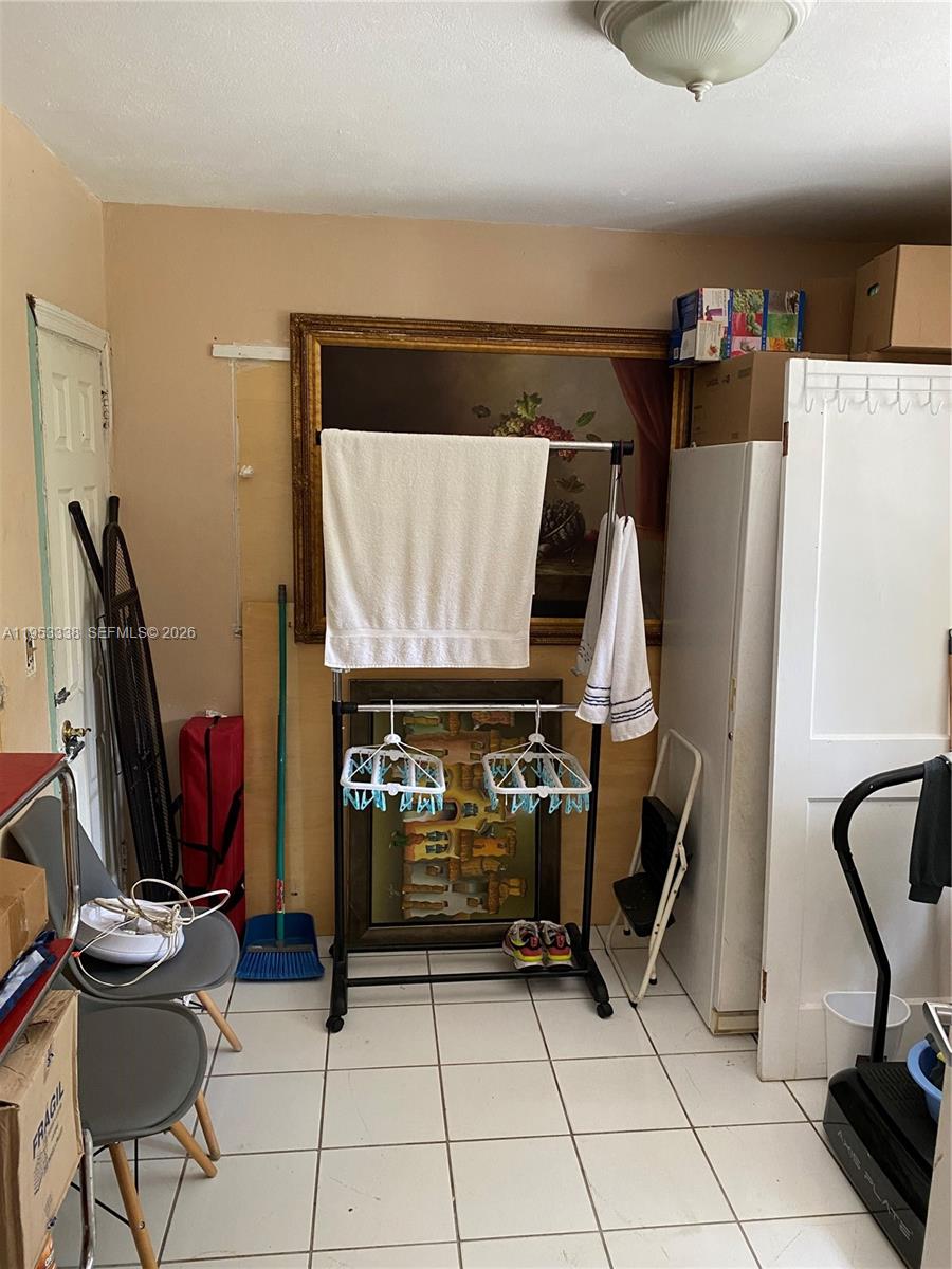 1455 Northwest 112th Street Miami, FL 33167 - Photo 18 of 19 a room with storage and utility