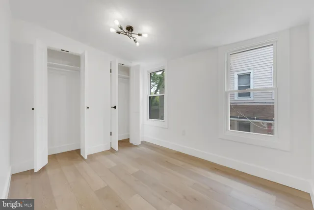 a view of empty room with windows