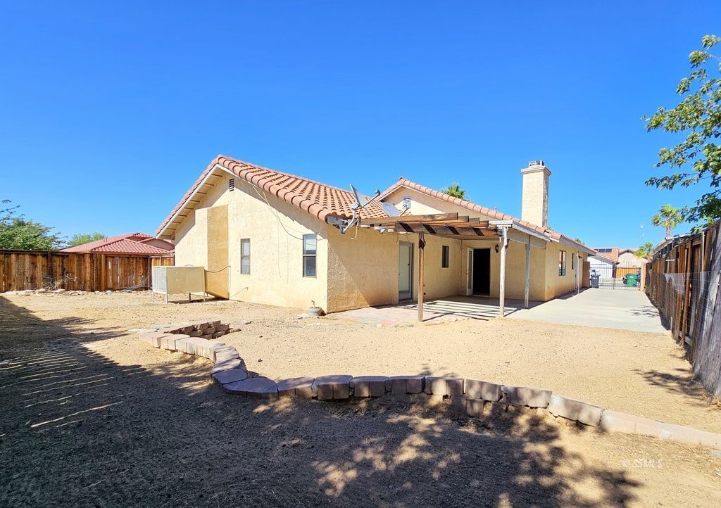 719 Regency Court Ridgecrest, CA 93555 - Photo 27 of 37 a view of a house with snow on the road