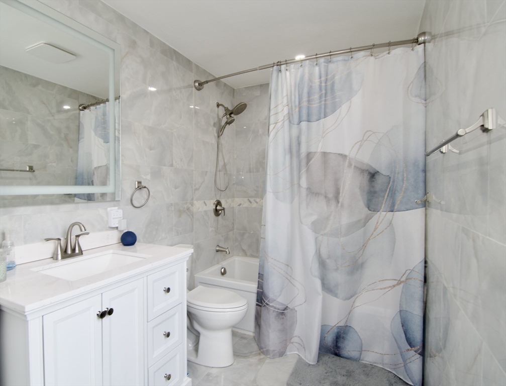 35 Anniversary Street Springfield, MA 01104 - Photo 29 of 37 a bathroom with a sink toilet and shower