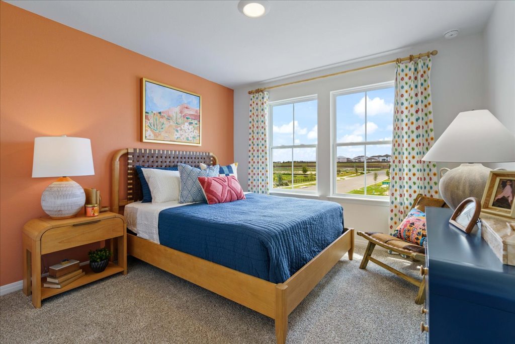 2513 Caleb Asher Loop Round Rock, TX 78665 - Photo 16 of 40 a bedroom with a bed and a window