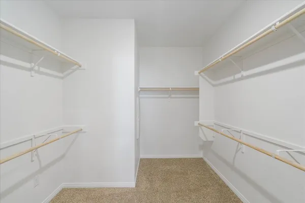 a bathroom with a double vanity sink mirror and double