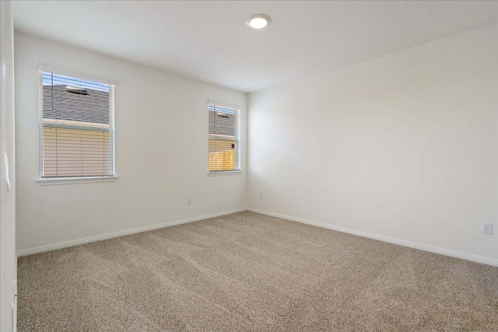 2513 Caleb Asher Loop Round Rock, TX 78665 - Photo 32 of 40 an empty room with windows