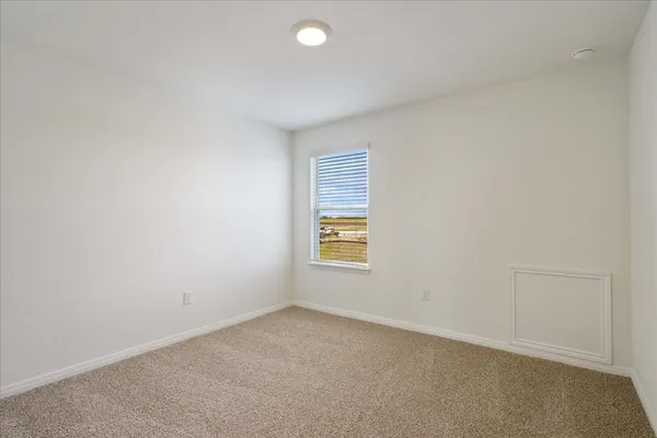 an empty room with a window