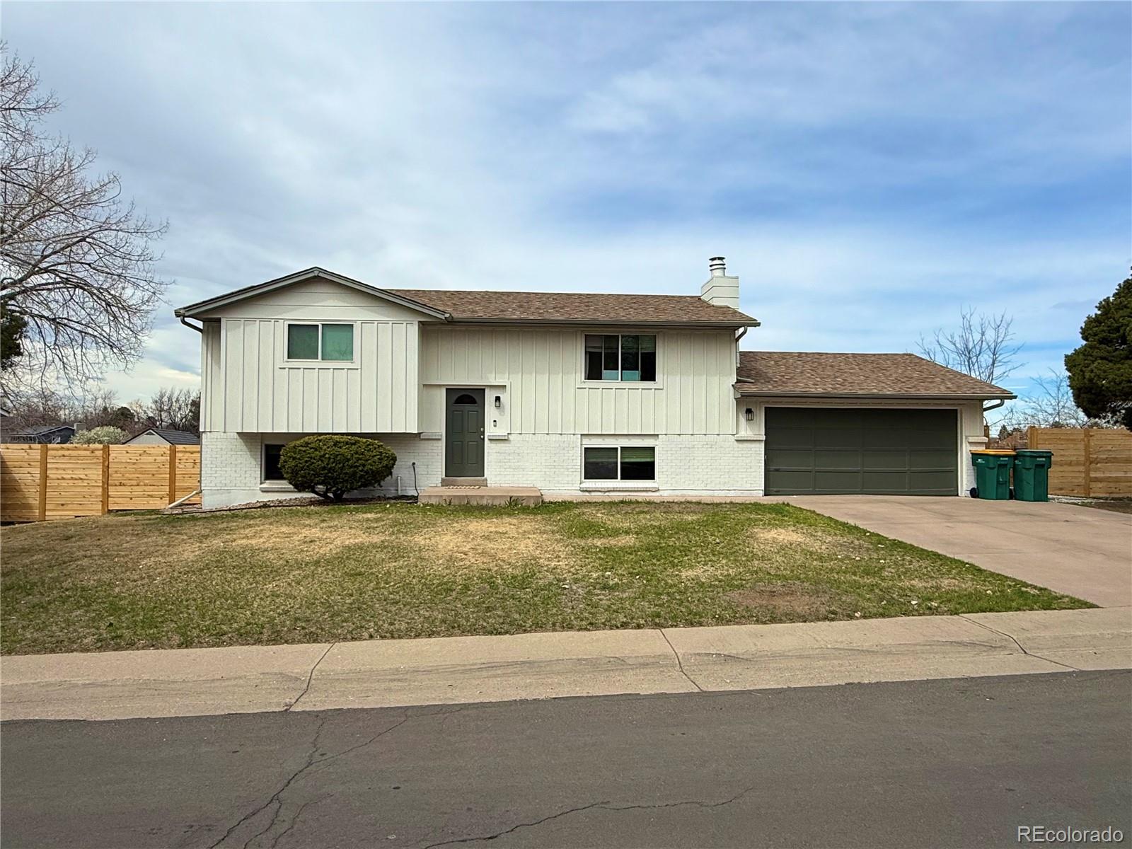 142 Helena Circle Lone Tree, CO 80124 - Photo 1 of 1 a house view with a outdoor space