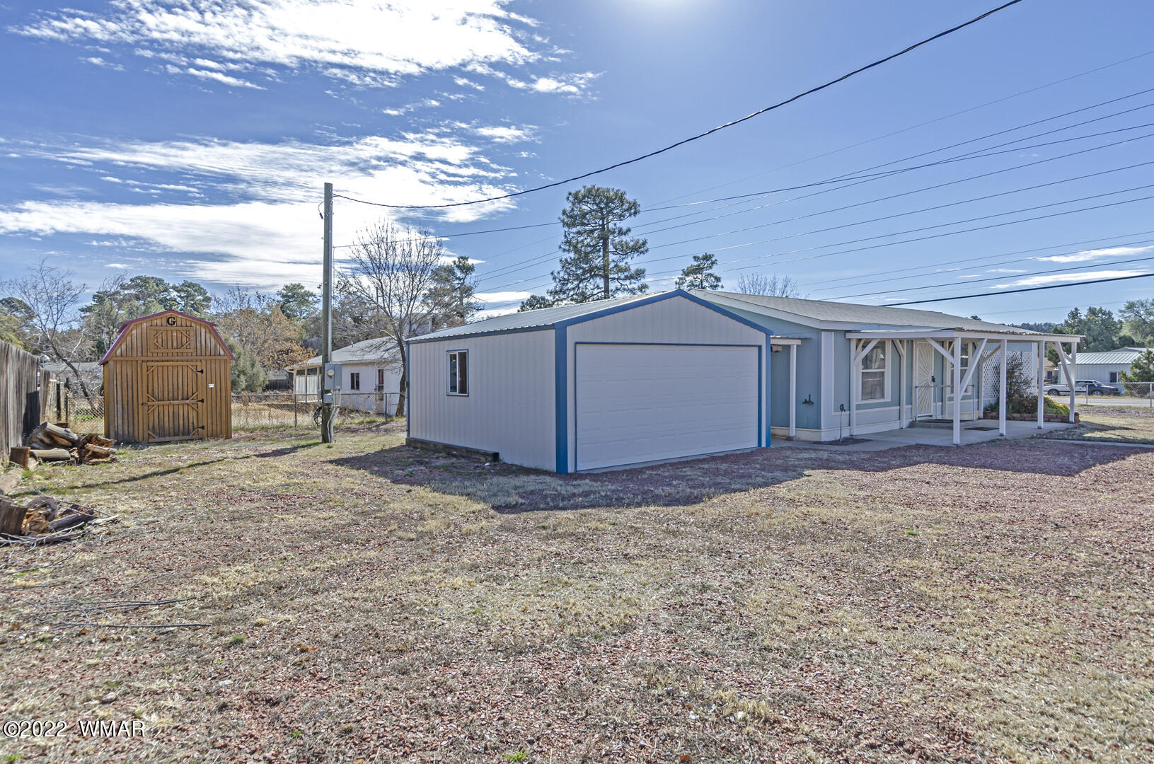 313 South Clark Road Payson, AZ 85541 - Photo 3 of 27 a view of a house with a backyard