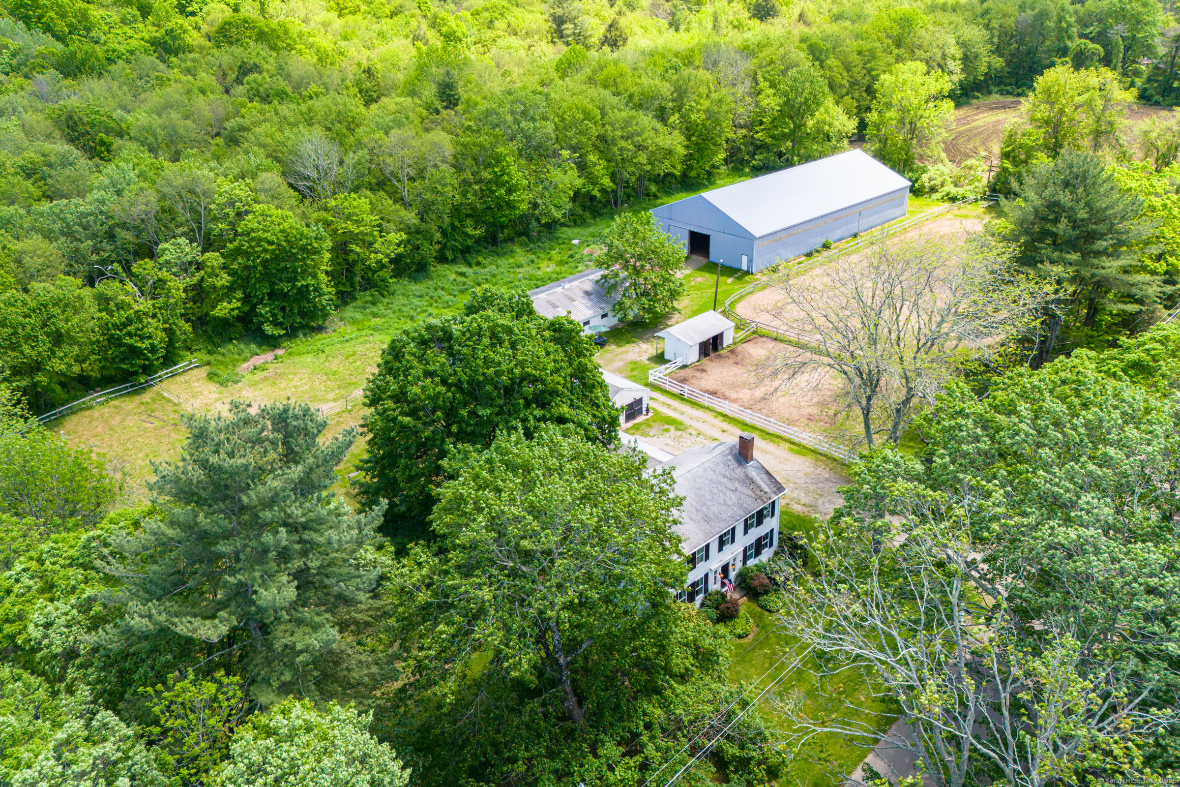 402 Perrin Road Woodstock, CT 06281 - Photo 1 of 40 an aerial view of a house with a yard