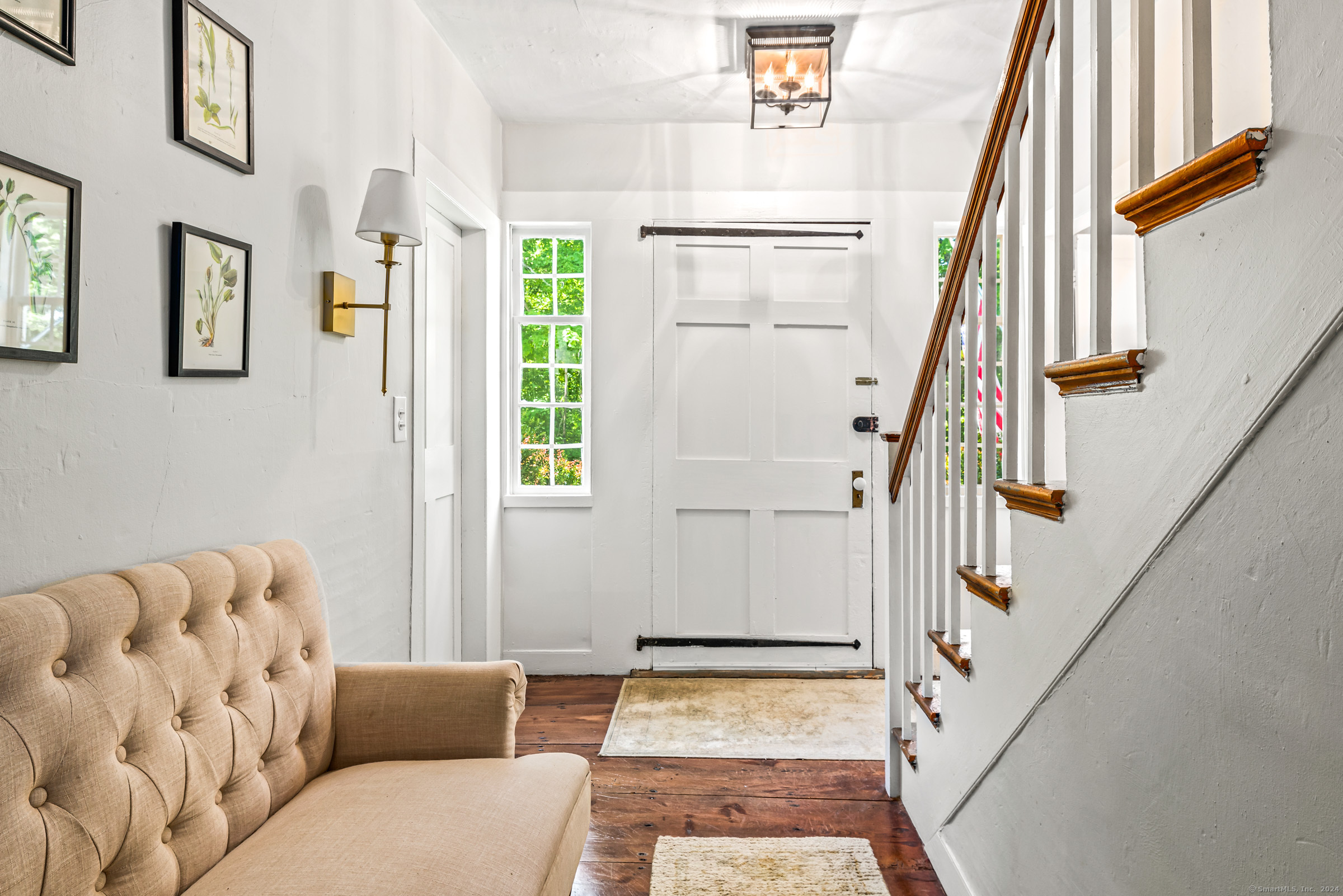 402 Perrin Road Woodstock, CT 06281 - Photo 18 of 40 a living room with furniture and a rug