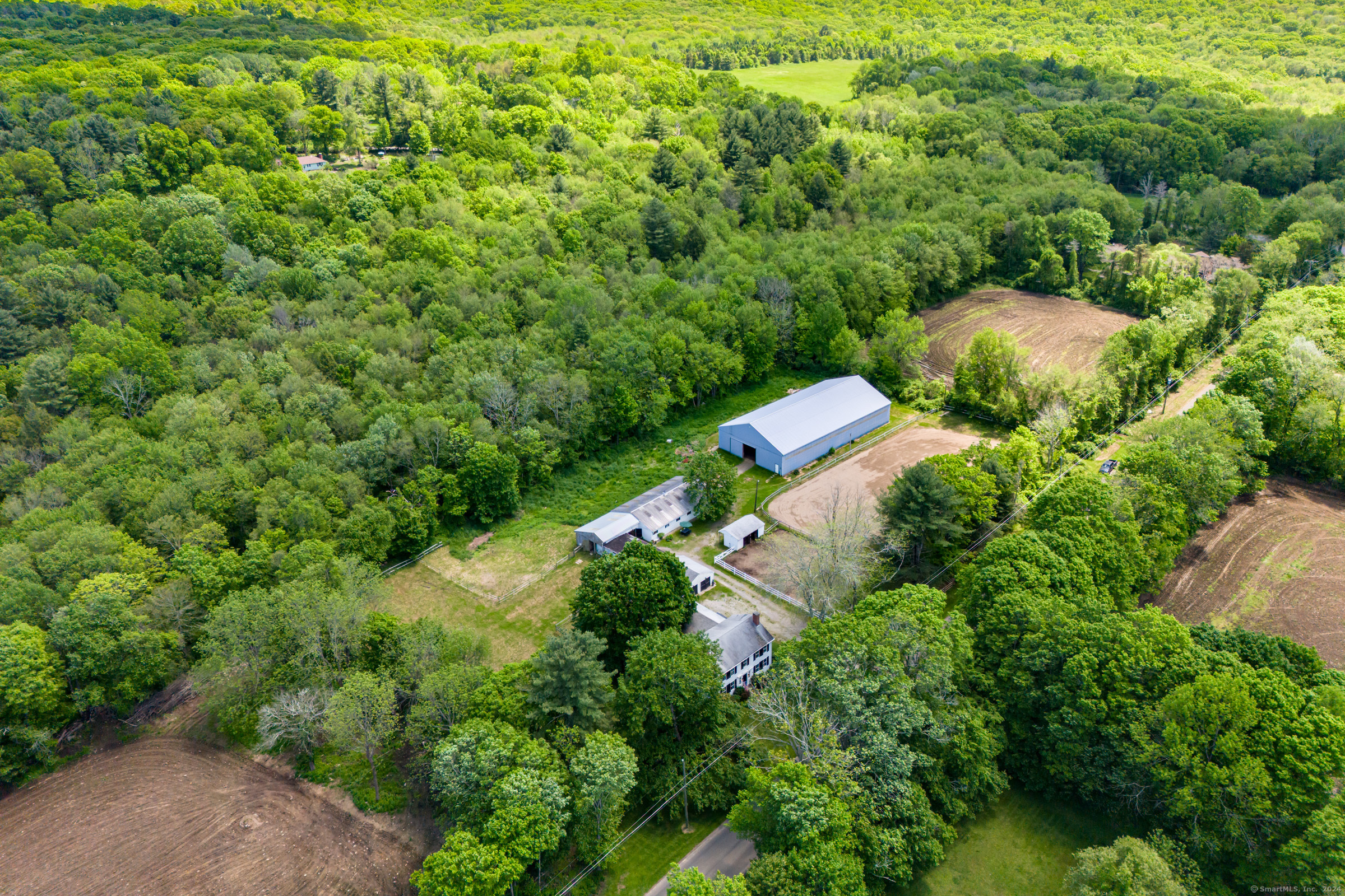 402 Perrin Road Woodstock, CT 06281 - Photo 39 of 40 an aerial view of a house with a yard and outdoor seating