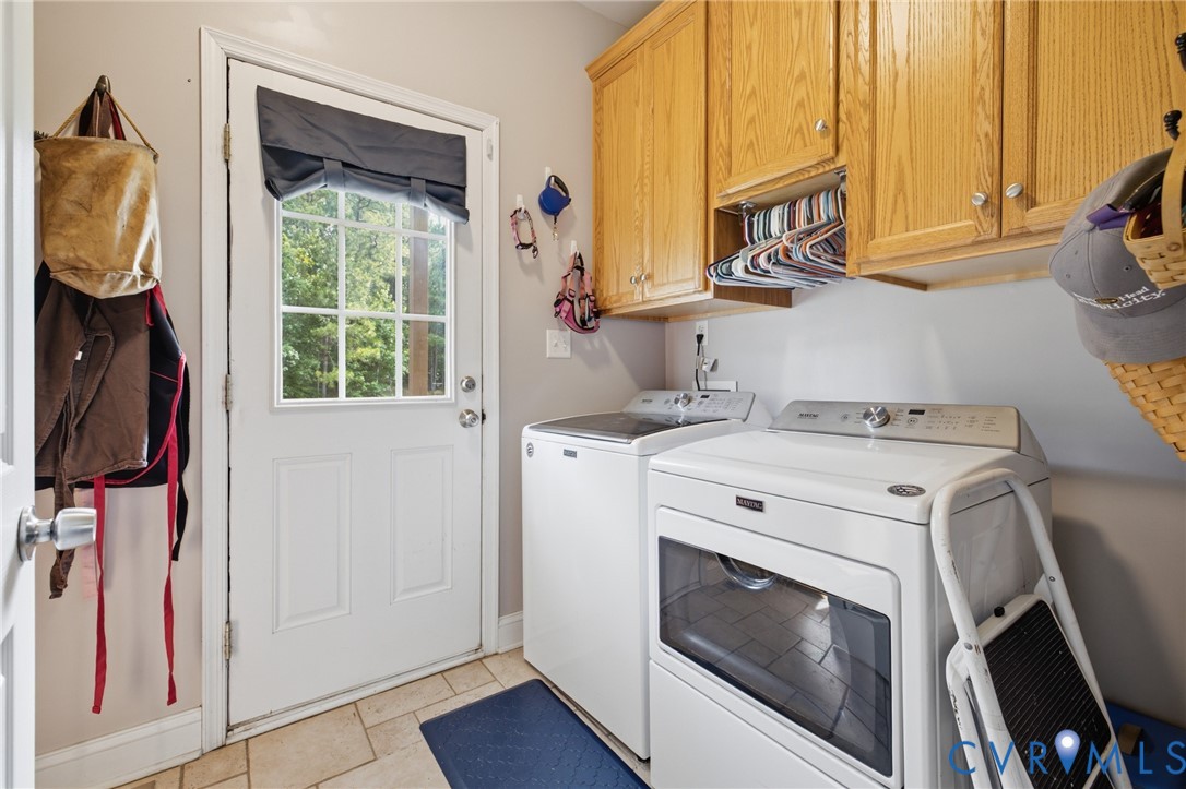 9433 Robin Road Disputanta, VA 23842 - Photo 13 of 26 Practical utility room featuring a tiled floor, de