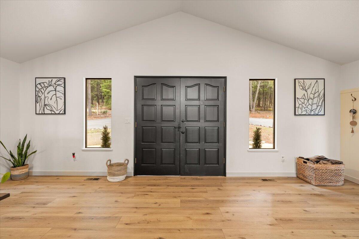 350 Splendor Drive Wilderville, OR 97543 - Photo 6 of 57 a view of an empty room with a window