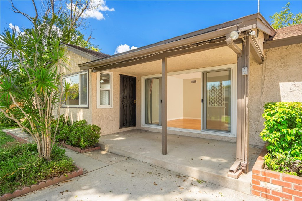19738 Gresham Street Northridge, CA 91324 - Photo 18 of 35 a front view of a house with a porch