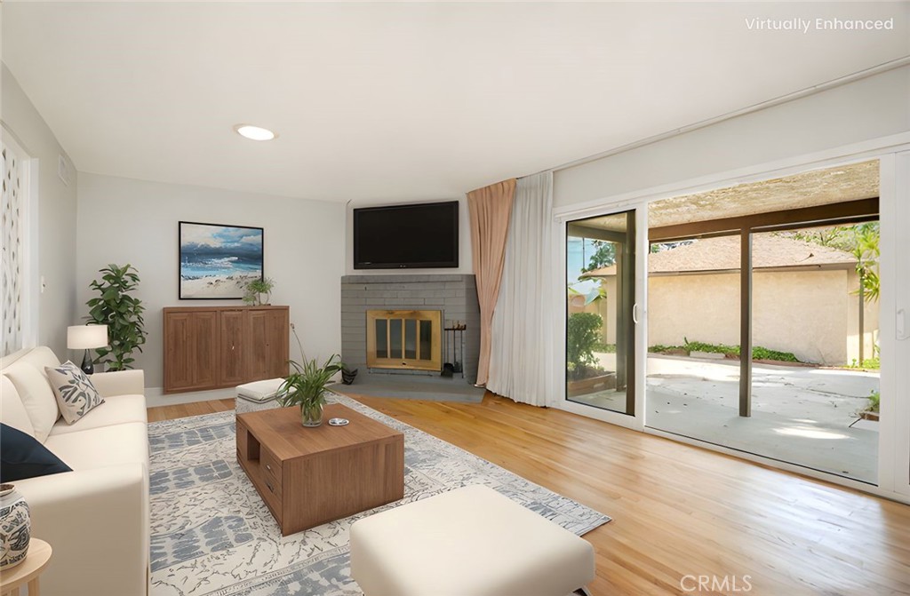 19738 Gresham Street Northridge, CA 91324 - Photo 2 of 35 a living room with furniture large window and a flat screen tv