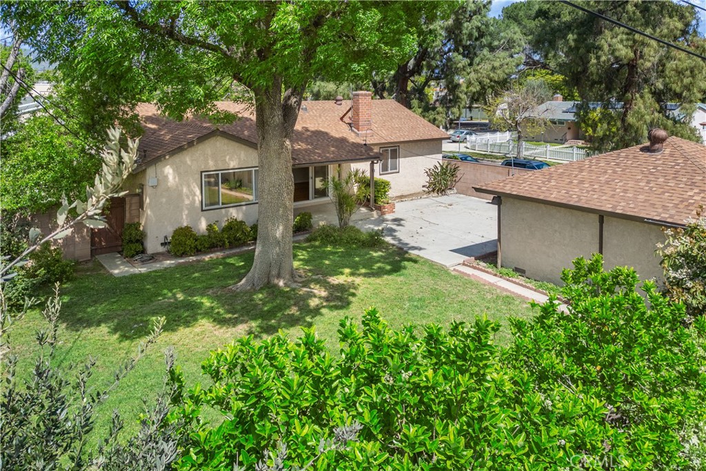 19738 Gresham Street Northridge, CA 91324 - Photo 27 of 35 a aerial view of a house with yard and green space