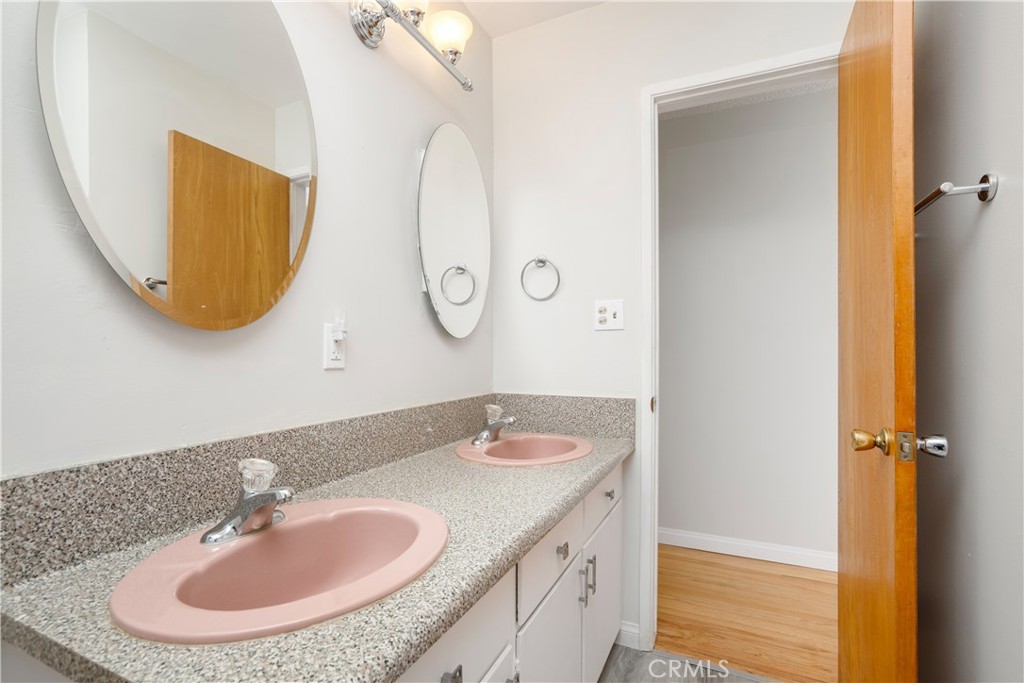 19738 Gresham Street Northridge, CA 91324 - Photo 10 of 35 a bathroom with a sink and a mirror
