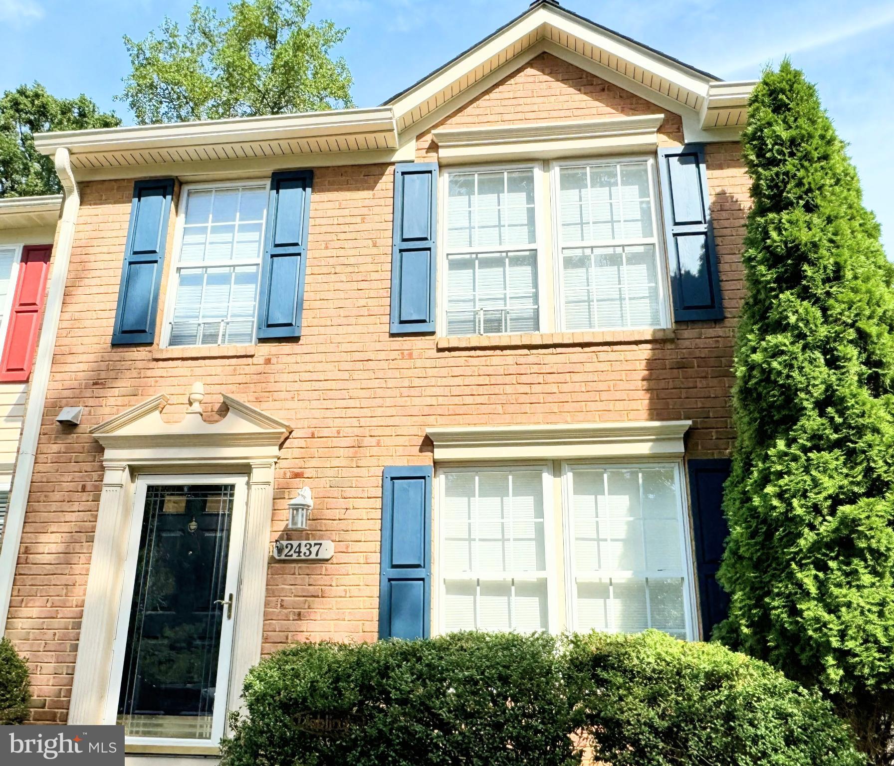 2437 High Brandy Way Odenton, MD 21113 - Photo 1 of 47 front view of a brick house with a large windows