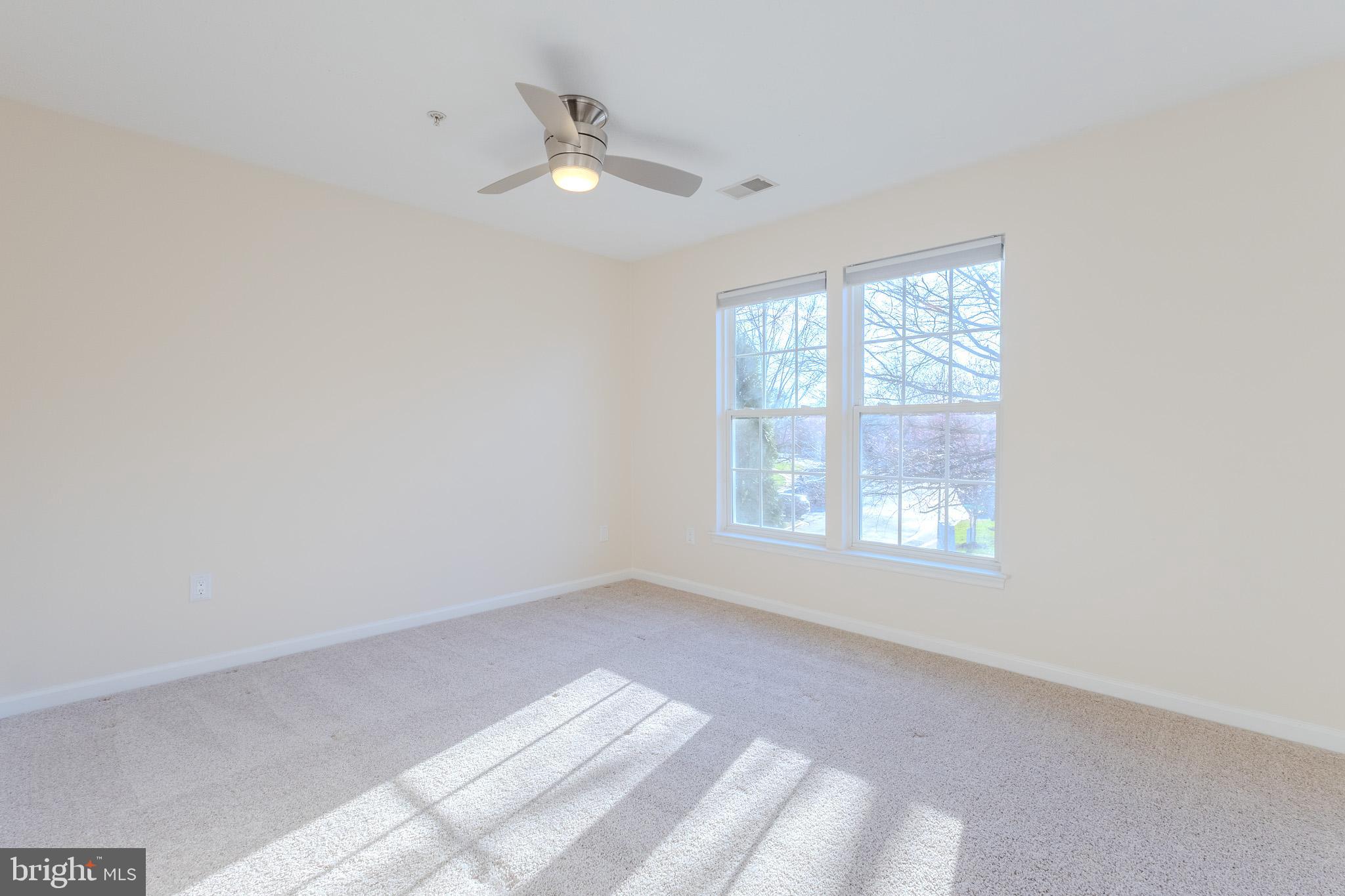 2437 High Brandy Way Odenton, MD 21113 - Photo 19 of 47 a view of an empty room with a window